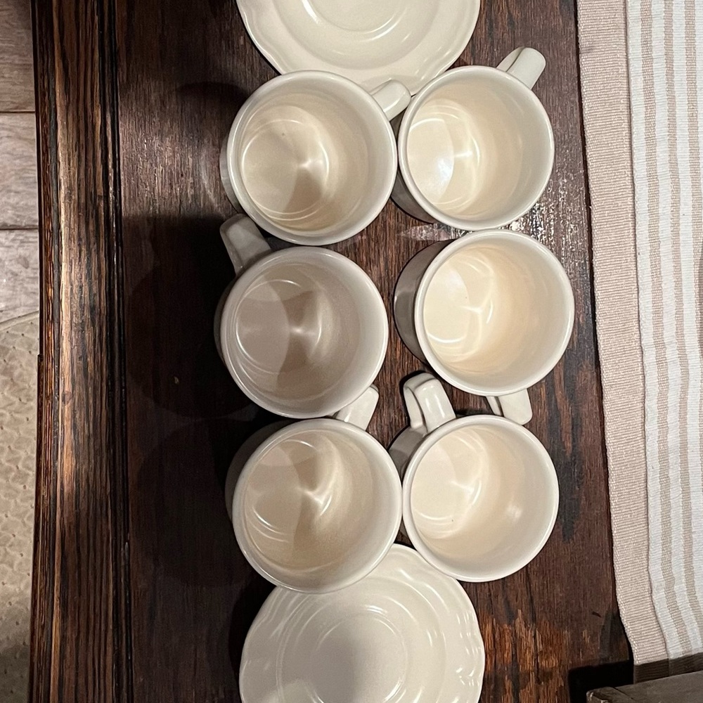 6 tea cups + saucers. Cream colored, by pfatzgraff. Made in the USA